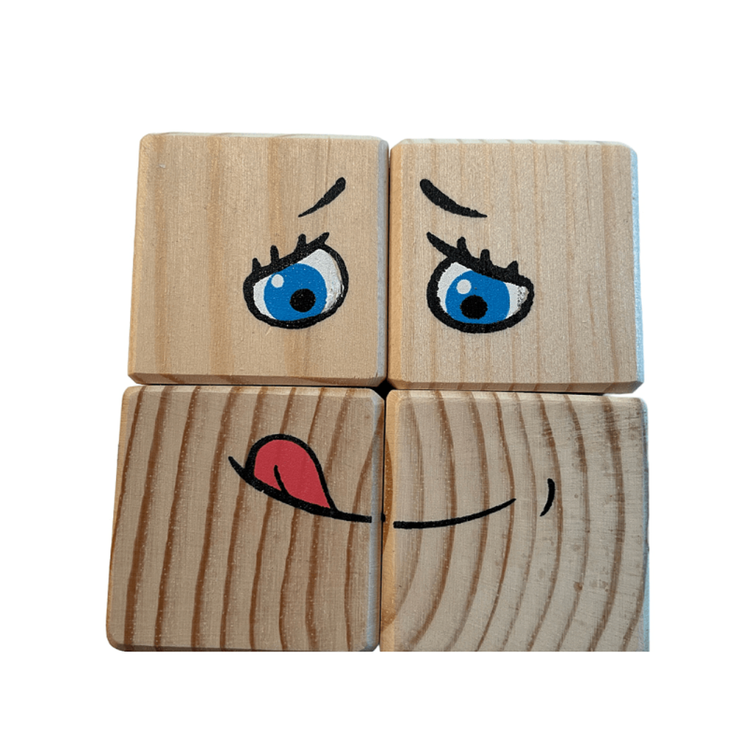 Träblock med ansiktsuttryck